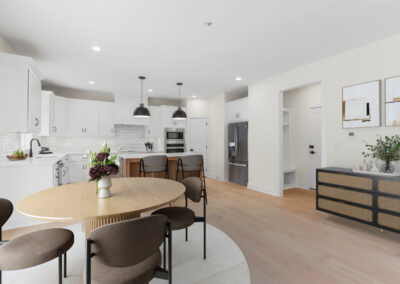 Modern open layout Kitchen, dinning room, and living room. Contact Brenn Luxury Homes